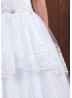 Illusion neckline Holy Communion gown with will skirt and lace detail and b...